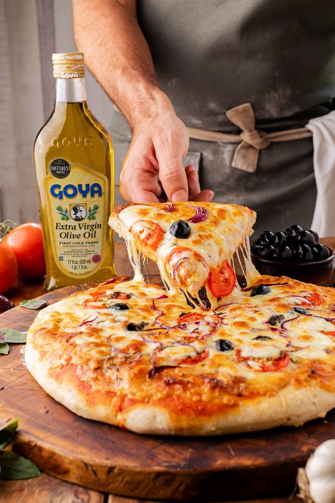 Homemade pizza with Goya Extra Virgin Olive Oil